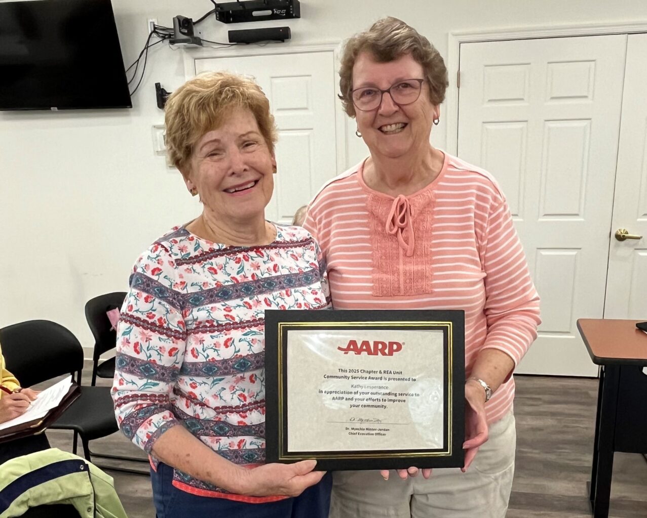 Charity Chairperson receives an award from our President